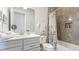 Bathroom featuring a vanity and tub shower with neutral tile at 283 Saint Lucia Dr # 202, Bradenton, FL 34209