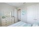 Bedroom featuring coastal decor and neutral paint at 283 Saint Lucia Dr # 202, Bradenton, FL 34209