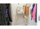 Organized walk-in closet with ample shelving for clothing and storage items at 283 Saint Lucia Dr # 202, Bradenton, FL 34209
