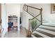 Inviting foyer with elegant staircase, marble floors, and stylish decor at 283 Saint Lucia Dr # 202, Bradenton, FL 34209