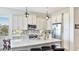 Modern kitchen featuring stainless steel appliances, granite countertops and a center island with barstool seating at 283 Saint Lucia Dr # 202, Bradenton, FL 34209