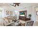 Cozy living room with vaulted ceilings, comfortable seating, and sliding doors to the lanai at 283 Saint Lucia Dr # 202, Bradenton, FL 34209