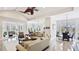 Open-concept living space with stylish furnishings, dining area, and gourmet kitchen at 283 Saint Lucia Dr # 202, Bradenton, FL 34209