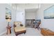Well-lit loft area featuring comfortable seating and view of the staircase at 283 Saint Lucia Dr # 202, Bradenton, FL 34209