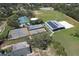 Aerial view of the park's tennis courts, recreational facilities, and expansive green space at 505 Hedge Row Rd, Brandon, FL 33510