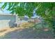 Beautifully maintained backyard features a playset and covered patio for outdoor enjoyment at 505 Hedge Row Rd, Brandon, FL 33510