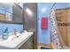 Bathroom vanity with tower and shower at 505 Hedge Row Rd, Brandon, FL 33510