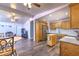 Open kitchen featuring stainless appliances seamlessly flowing into a cozy living space at 505 Hedge Row Rd, Brandon, FL 33510
