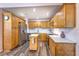 Modern kitchen featuring stainless steel appliances and quartz countertops at 505 Hedge Row Rd, Brandon, FL 33510