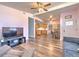 Inviting living room with new flooring flowing into an open-concept kitchen at 505 Hedge Row Rd, Brandon, FL 33510