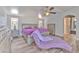 Comfortable Primary bedroom features hardwood flooring, bright windows, and calming paint at 505 Hedge Row Rd, Brandon, FL 33510