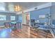 This office features hardwood floors, natural lighting, and is adjacent to the dining area at 505 Hedge Row Rd, Brandon, FL 33510