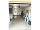 Garage space featuring laundry hookups, storage shelving, and an open layout offering flexible usage at 4213 Temple Heights Rd, Tampa, FL 33617