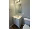 Cozy bathroom with modern vanity, mirror and lighting at 4617 John Bell Jr Dr, Tampa, FL 33610
