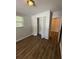 Bright bedroom with closet and modern flooring at 4617 John Bell Jr Dr, Tampa, FL 33610