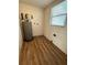 Laundry area with new flooring, water heater and window at 4617 John Bell Jr Dr, Tampa, FL 33610