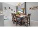Elegant dining room with decorative chandelier and natural light at 6438 Milestone Loop, Palmetto, FL 34221