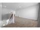 A bright and airy loft with neutral carpeting and modern finishes, perfect for a flexible living space at 6438 Milestone Loop, Palmetto, FL 34221