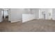 Large loft featuring plush carpeting and a half wall at 6438 Milestone Loop, Palmetto, FL 34221
