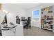 Office with a computer, and bookshelf, perfect for remote work or studying at 6438 Milestone Loop, Palmetto, FL 34221