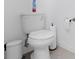 This half-bathroom features neutral tones and a toilet at 6438 Milestone Loop, Palmetto, FL 34221