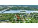 Stunning aerial view showcasing the waterfront property and surrounding natural beauty at 9503 Alice Ln, Riverview, FL 33578