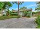 A charming home with a lush lawn and mature landscaping at 9503 Alice Ln, Riverview, FL 33578