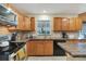 Well-equipped kitchen with stainless steel appliances and spacious countertops at 9503 Alice Ln, Riverview, FL 33578