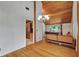 Living room with wood floors and chandelier at 9503 Alice Ln, Riverview, FL 33578