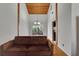 Living room with hardwood floors, high ceilings, and chandelier at 9503 Alice Ln, Riverview, FL 33578