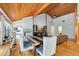 Open-concept living room and dining area offering a bright fireplace and vaulted ceilings at 9503 Alice Ln, Riverview, FL 33578