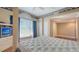 Spacious bedroom with a large window, neutral tones and an adjacent closet area at 112 Osprey Point Dr, Osprey, FL 34229