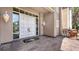 Elegant double front door framed by sidelights, classic sconces, and brick pavers at 112 Osprey Point Dr, Osprey, FL 34229