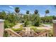 Beautiful circular brick driveway lined with mature palm trees at this home's entrance at 112 Osprey Point Dr, Osprey, FL 34229