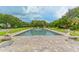 Serene water feature surrounded by lush landscaping in a well-maintained community at 112 Osprey Point Dr, Osprey, FL 34229
