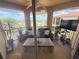 Cozy balcony with comfortable seating and views of the surrounding neighborhood at 4333 Bayside Village Dr # 310, Tampa, FL 33615