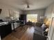 Bedroom features a ceiling fan, hardwood floors, and a large window for plenty of natural light at 4333 Bayside Village Dr # 310, Tampa, FL 33615