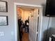 Walk-in closet with ample storage for clothing and accessories and a partial view of the floor at 4333 Bayside Village Dr # 310, Tampa, FL 33615