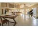 Interior shot with comfortable seating areas, a piano, and plenty of natural light at 4333 Bayside Village Dr # 310, Tampa, FL 33615