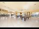 Spacious game room featuring pool tables, tile flooring, and ample natural light at 4333 Bayside Village Dr # 310, Tampa, FL 33615