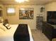 Charming bedroom with a queen-sized bed, decorative wall art, and comfortable setting at 7026 Lenape Cir, New Port Richey, FL 34653