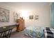Cozy bedroom with soft carpet, twin bed, and a light wood dresser at 7418 Riverbank Dr, New Port Richey, FL 34655