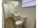 Updated bathroom with double sink vanity and walk-in shower at 22011 Catherine Ave, Port Charlotte, FL 33952