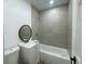 Cozy bathroom featuring a tub, vanity, and toilet at 22011 Catherine Ave, Port Charlotte, FL 33952