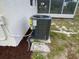 Exterior view of the home's air conditioning unit and pump at 22011 Catherine Ave, Port Charlotte, FL 33952