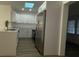 Contemporary kitchen with stainless steel appliances, white cabinetry, and quartz countertops at 22011 Catherine Ave, Port Charlotte, FL 33952