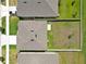 Aerial view of backyard including roof and driveway at 5289 Fiddle Fig Ave, Wimauma, FL 33598