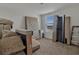Unfurnished bedroom with neutral carpet, awaiting your personal touch at 5289 Fiddle Fig Ave, Wimauma, FL 33598