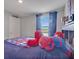 bedroom with a vibrant Spider-Personal theme, creating a fun and playful space at 5289 Fiddle Fig Ave, Wimauma, FL 33598