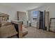 Unfurnished spare room with carpet flooring and a window with natural light at 5289 Fiddle Fig Ave, Wimauma, FL 33598